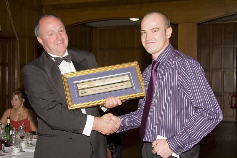 ABC Ball07-022.jpg - Stuart Pressage receives the Silver Oar award from last year's ABC Captain, Dave Ward